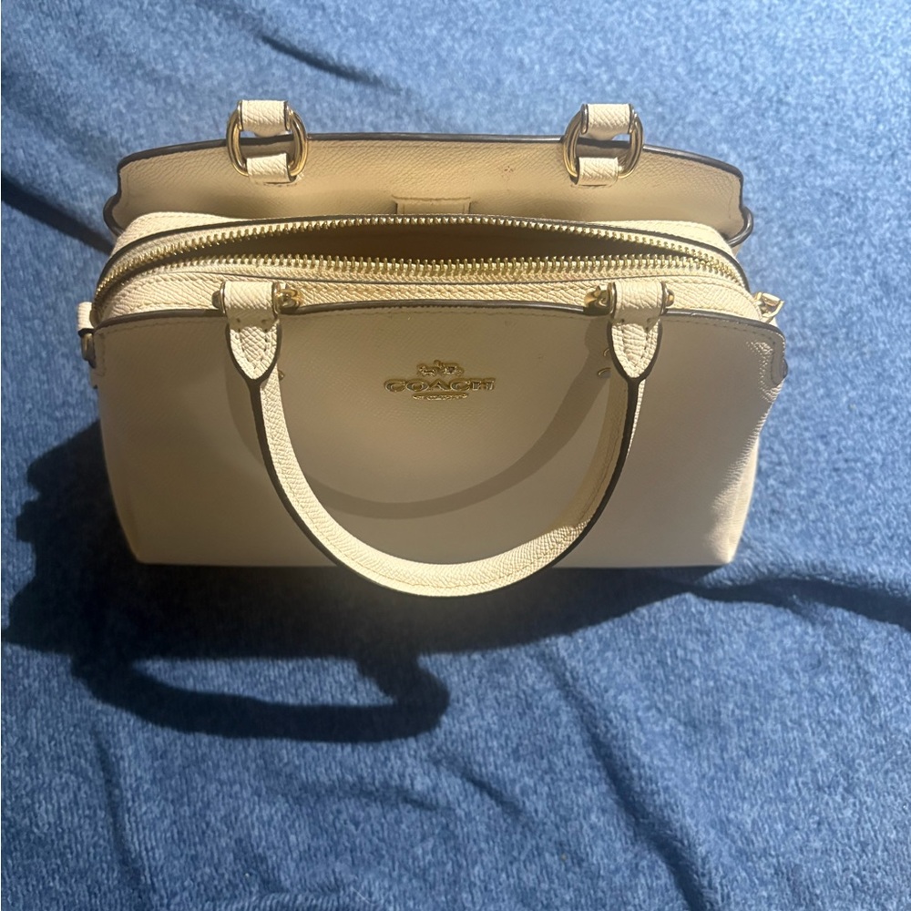 Coach Bag, has been used maybe three times times

Beautiful bag